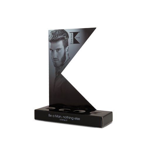 Espositore da banco sagomato con alloggi per prodotti cosmetici